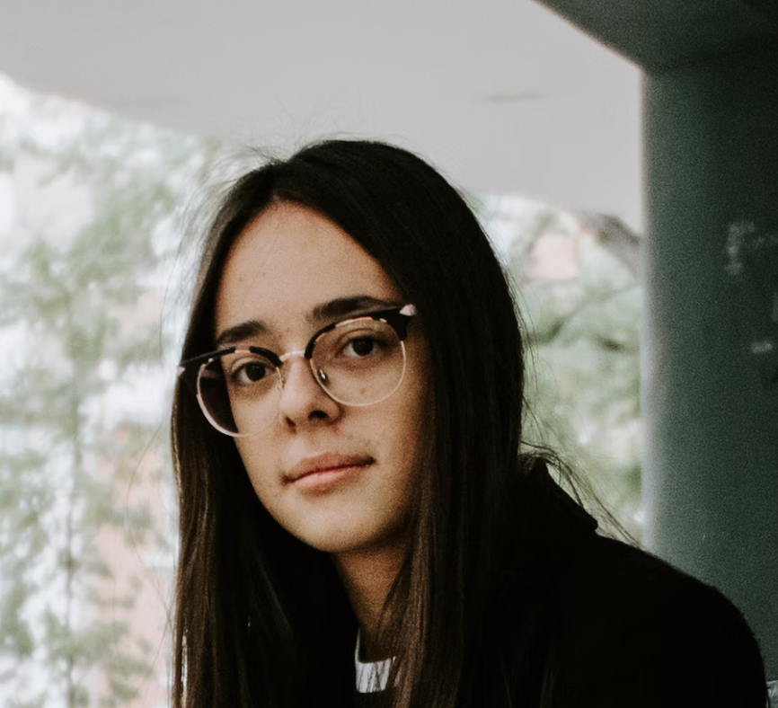 Woman with glasses outdoors